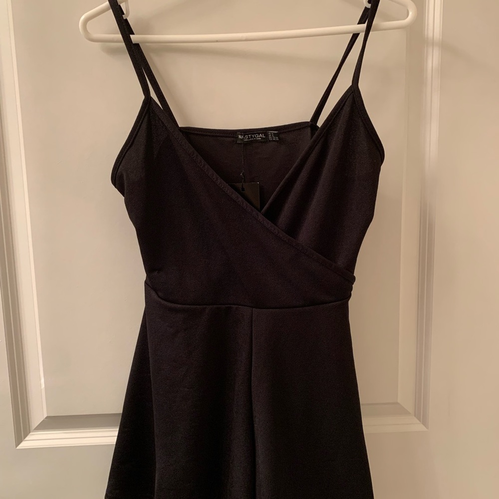 NWT Nasty Gal Black Low V Cut Romper Woman’s Size 6